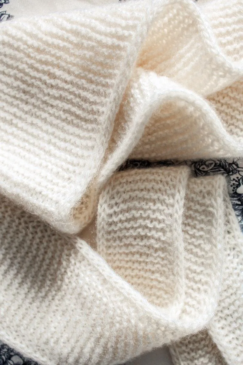 Pull en cachemire et laine mérinos avec texture côtelée, style workwear élégant